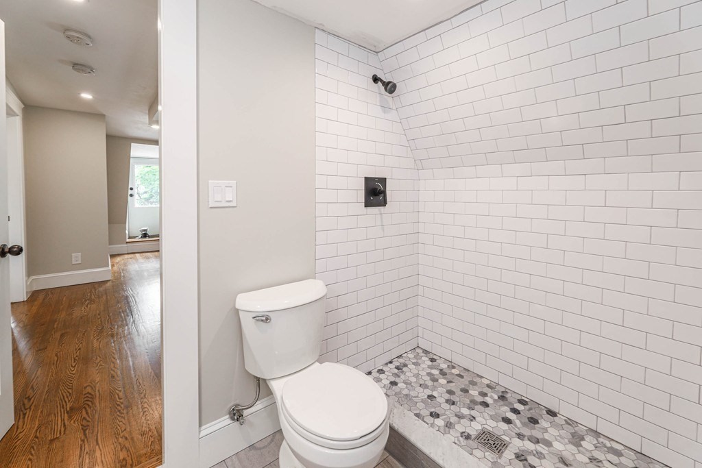 52 Maple Street, Unit 2 Boston, MA 02136 - Photo 30 of 41 a bathroom with a toilet and a shower