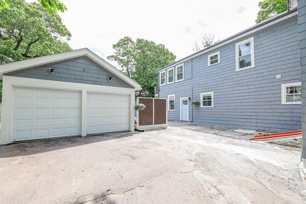 52 Maple Street, Unit 2 Boston, MA 02136 - Photo 39 of 41 a view of a house with a garage