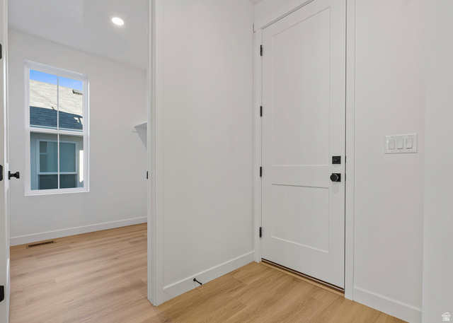 11214 South Easy Bee Road, Unit 270 South Jordan, UT 84009 - Photo 13 of 31 White interior door with contemporary black hardware