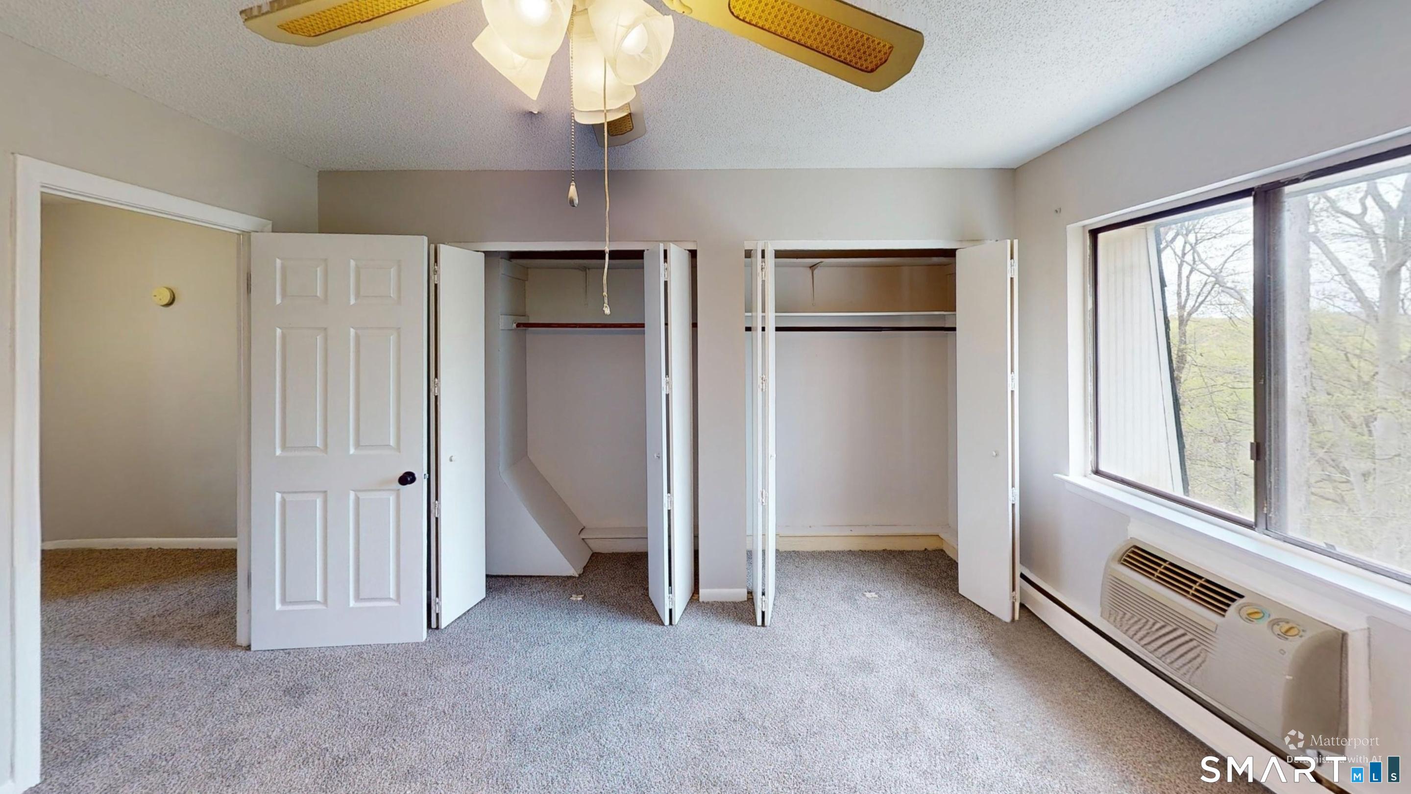 158 High Path Road, Unit 158 Windsor, CT 06095 - Photo 14 of 20 wooden floor in an empty room