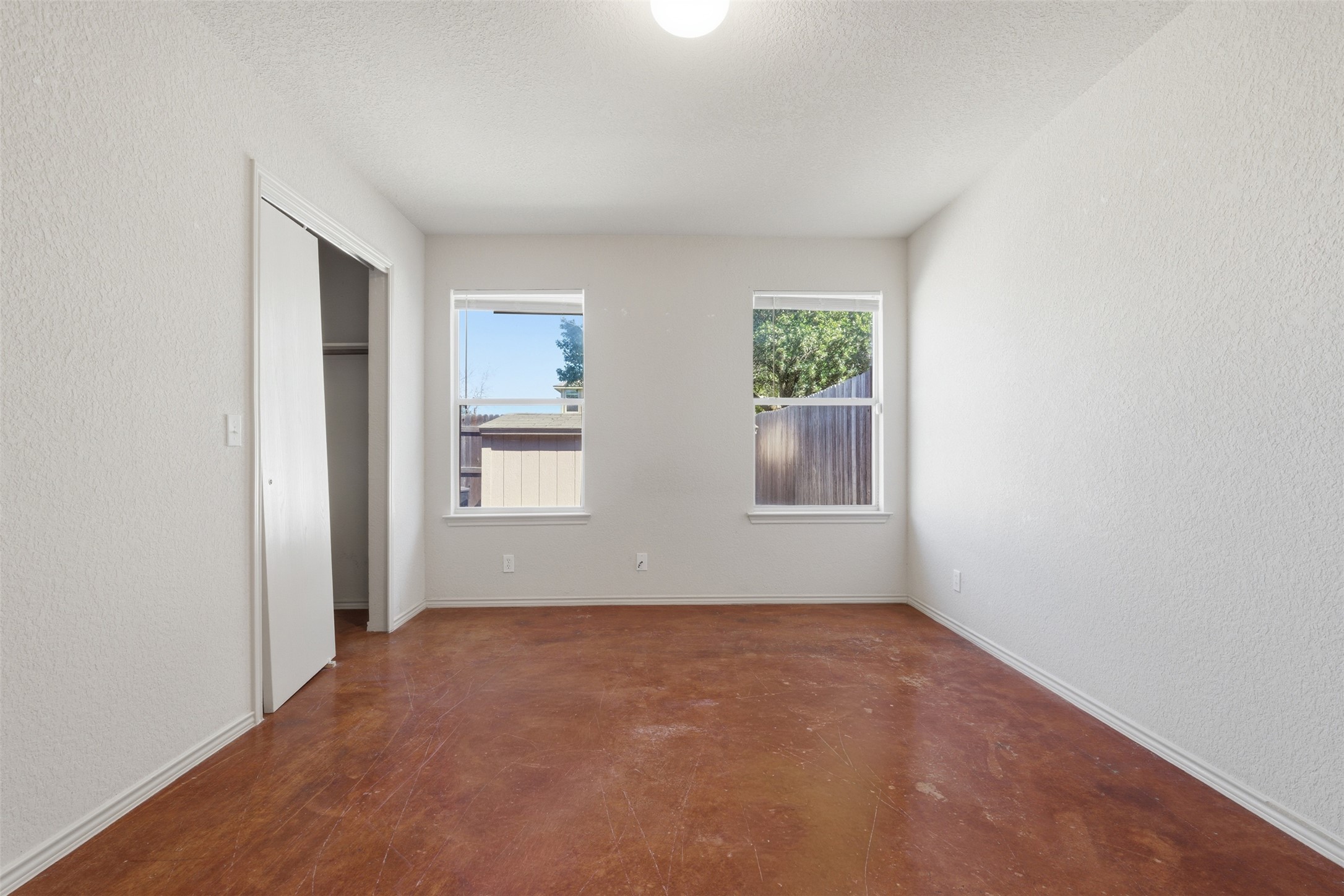 4529 Secure Lane, Unit 31 Austin, TX 78725 - Photo 17 of 38 an empty room with windows