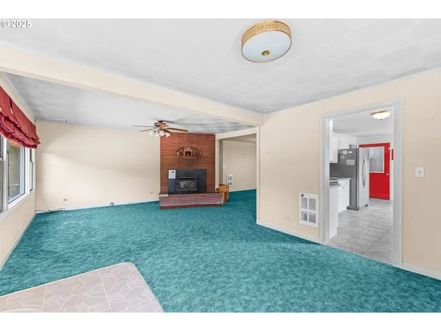 a view of living room and hall with furniture