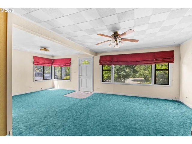 a very nice looking room with a large window