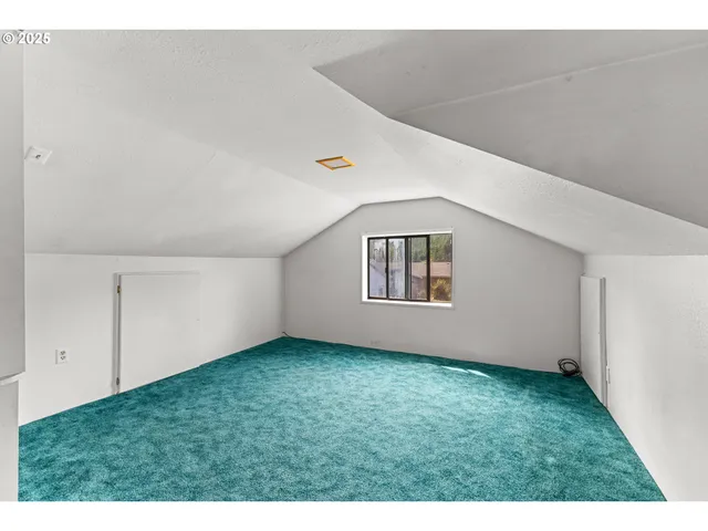 a view of an empty room with window