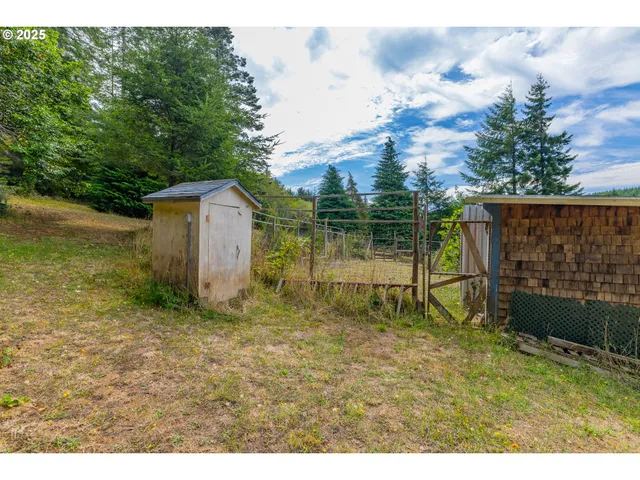 a backyard of a house with lots of green space