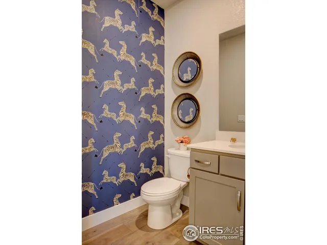 a bathroom with a toilet and a sink