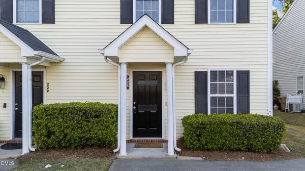 a view of a house with a garden