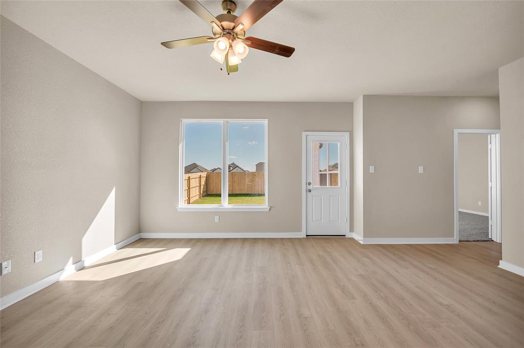 262 Boatright Boulevard Jarrell, TX 76537 - Photo 18 of 30 Spare room featuring light wood-style flooring and a ceiling fan