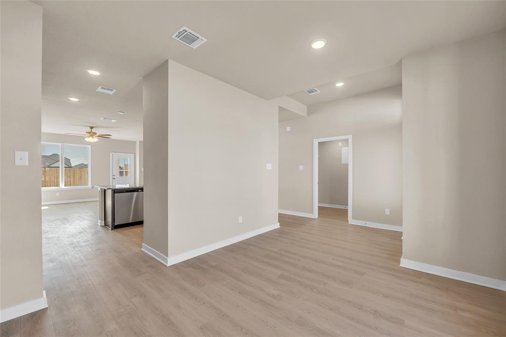 262 Boatright Boulevard Jarrell, TX 76537 - Photo 21 of 30 Spare room with recessed lighting, light wood-style floors, and a ceiling fan