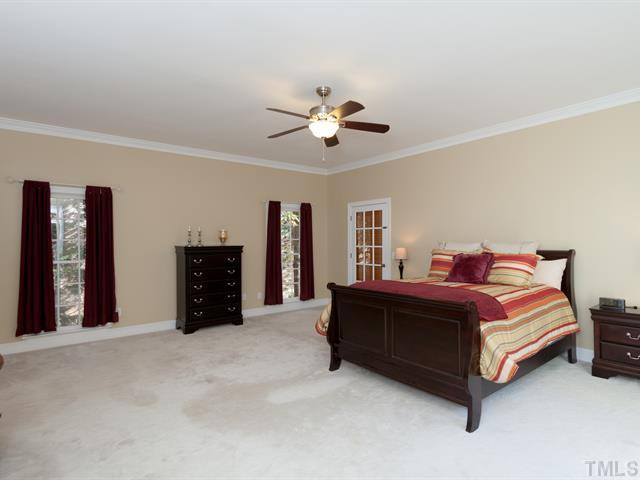 1929 Partridge Berry Drive Raleigh, NC 27606 - Photo 10 of 25 Sleep well in the first floor master suite. A French door opens to the private master sitting area. Master Suite