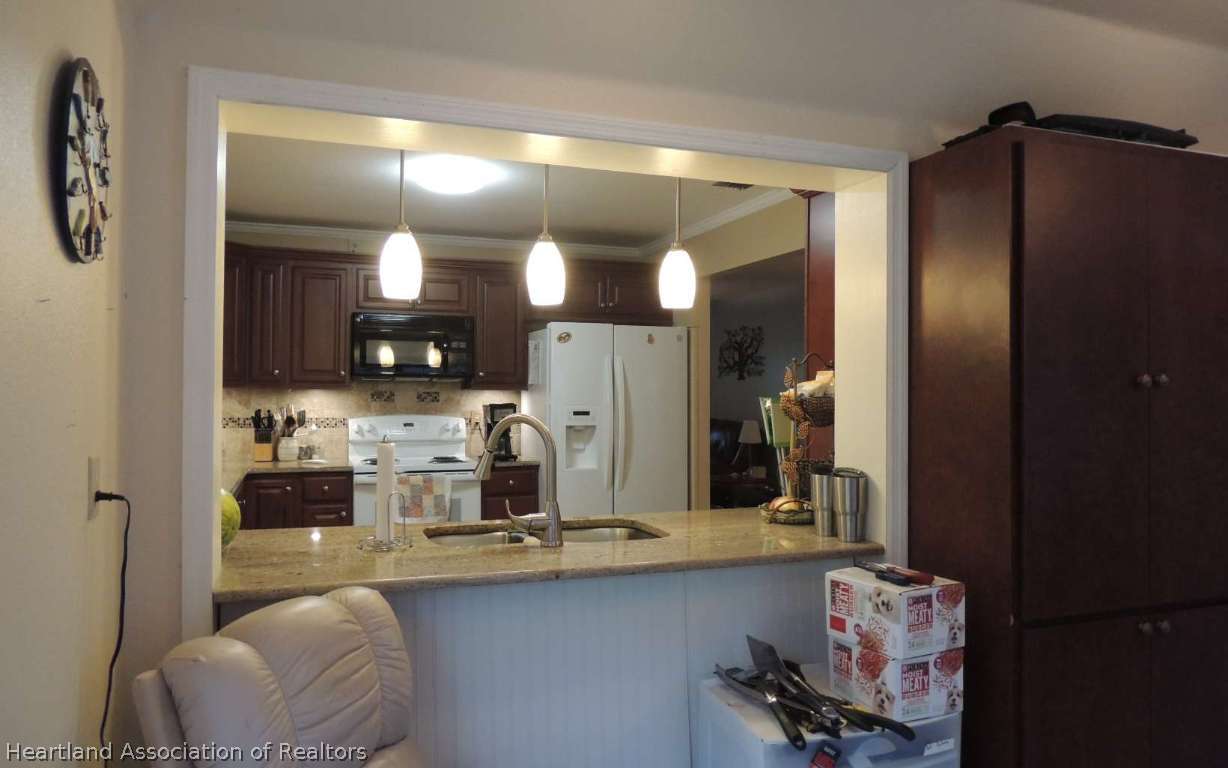 118 Spring Garden Road Sebring, FL 33870 - Photo 7 of 19 Pass through to Kitchen