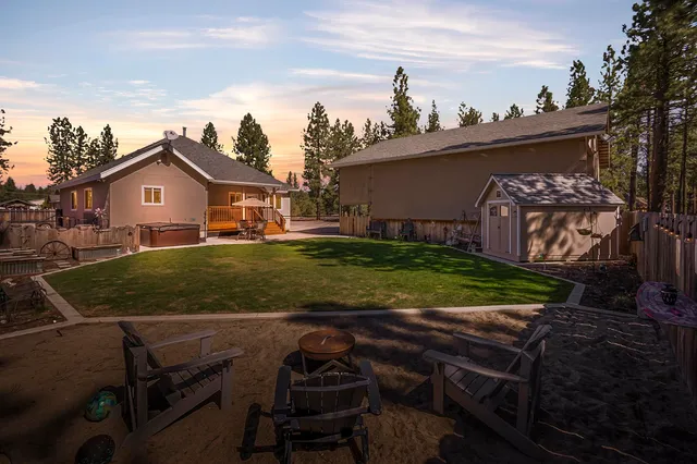 a view of a yard in front of a house with a yard