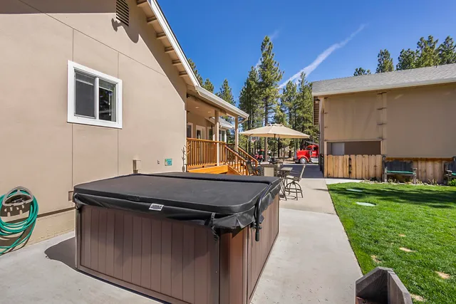 a view of a house with a sink and yard