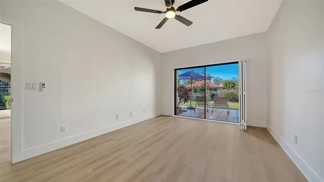 a bathroom with a sink a toilet a shower and a mirror