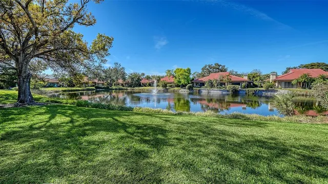 a view of a lake with a garden