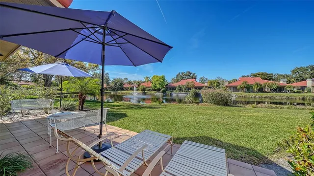 a view of a balcony with wooden fence