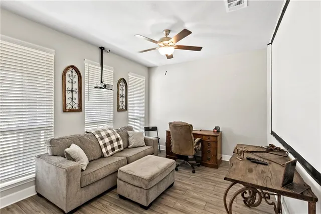 a living room with furniture and a window