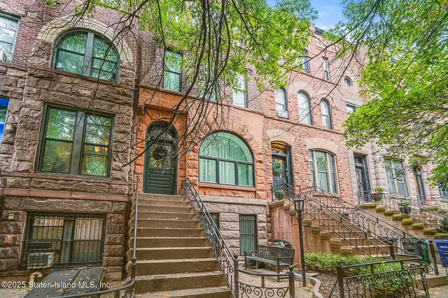 a view of a hallway with windows