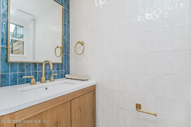 a view of a hallway with a white walls