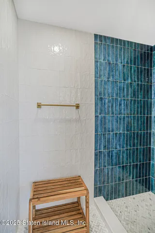 a view of gallery with wooden floor