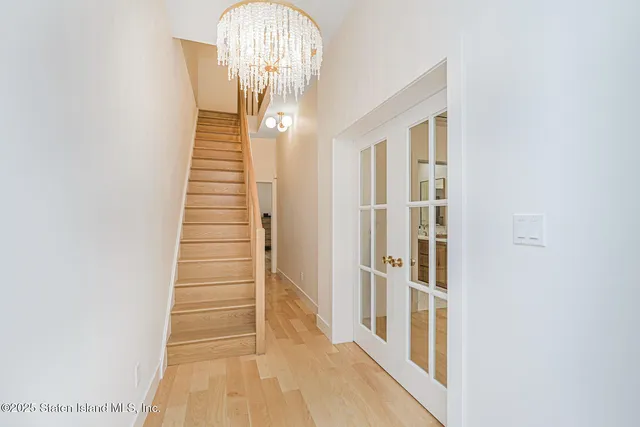 a spacious bathroom with a shower and a sink