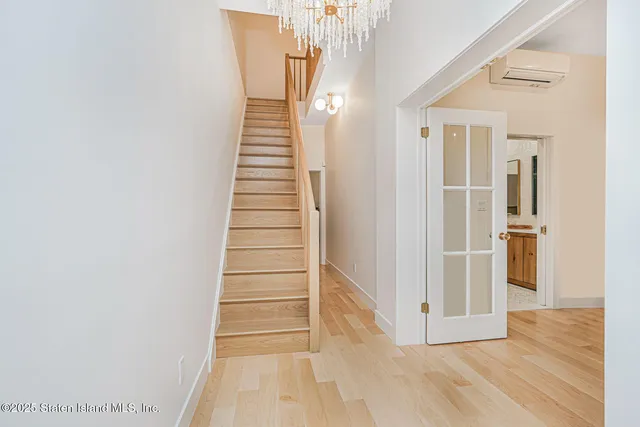 a bathroom with a shower and a sink