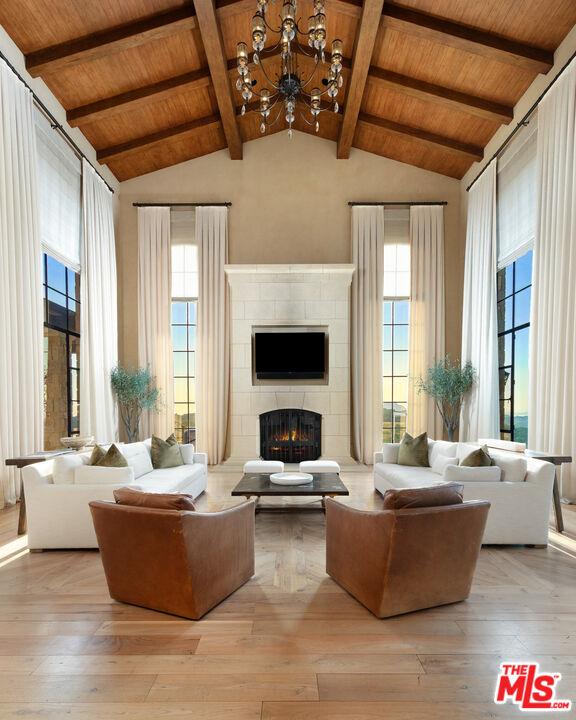 340 Kanan Dume Road Malibu, CA 90265 - Photo 14 of 57 a living room with couches and a fireplace