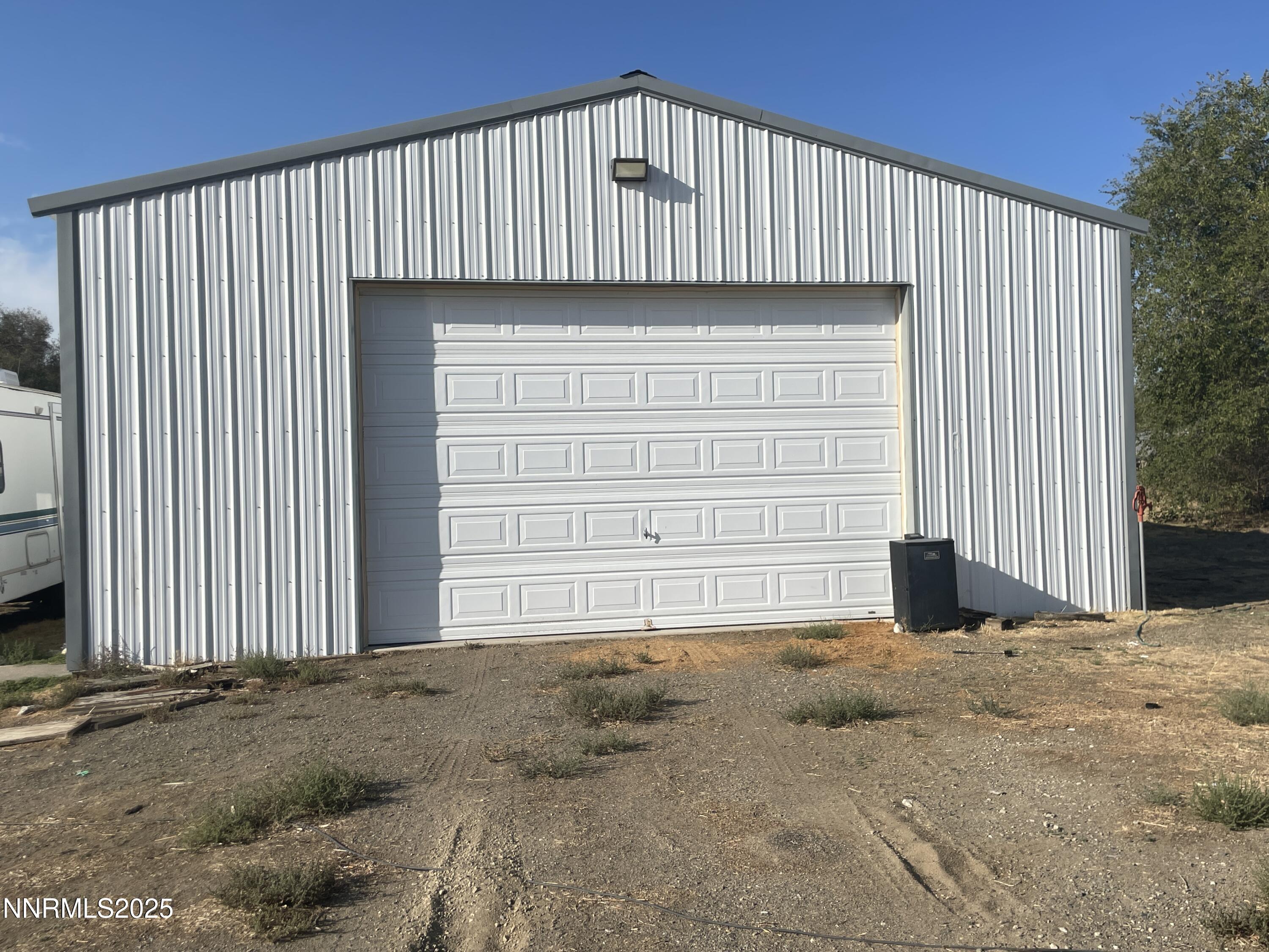 7375 Allen Road Winnemucca, NV 89445 - Photo 4 of 5 a view of a house with a garage