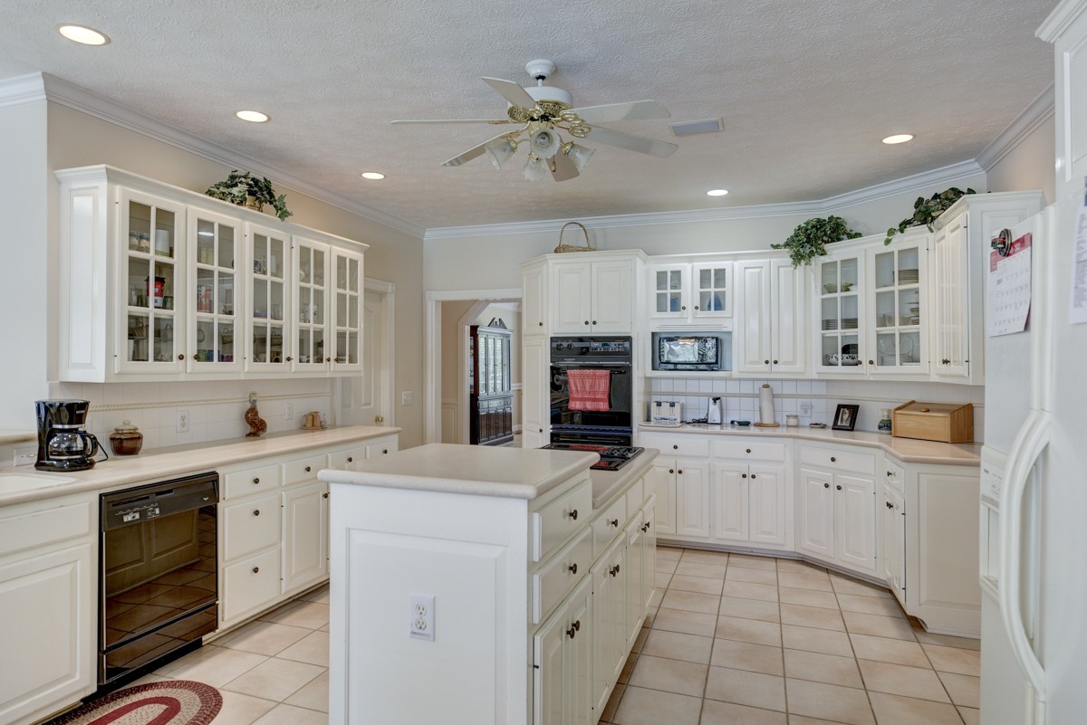 519 Maple Hill Road Lebanon, TN 37087 - Photo 15 of 49 a kitchen with a sink stove and cabinets