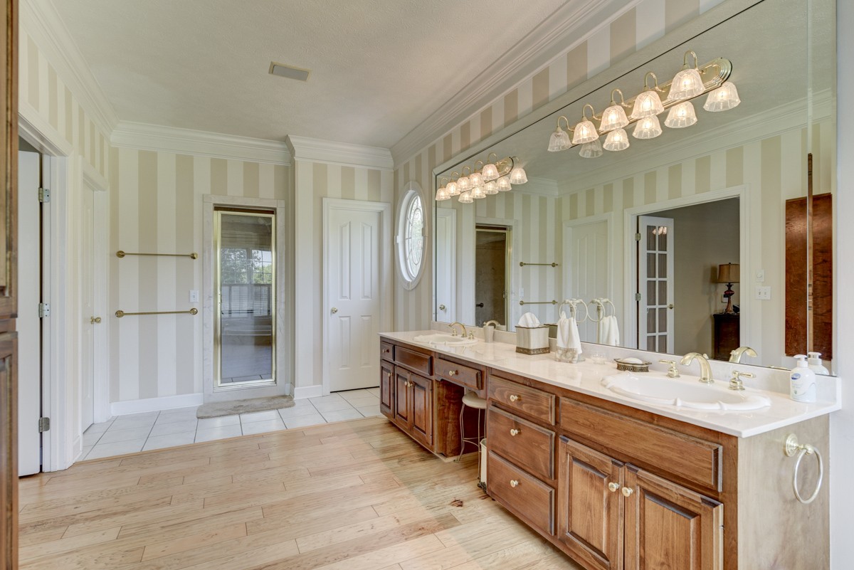 519 Maple Hill Road Lebanon, TN 37087 - Photo 25 of 49 a bathroom with a sink double vanity and a mirror
