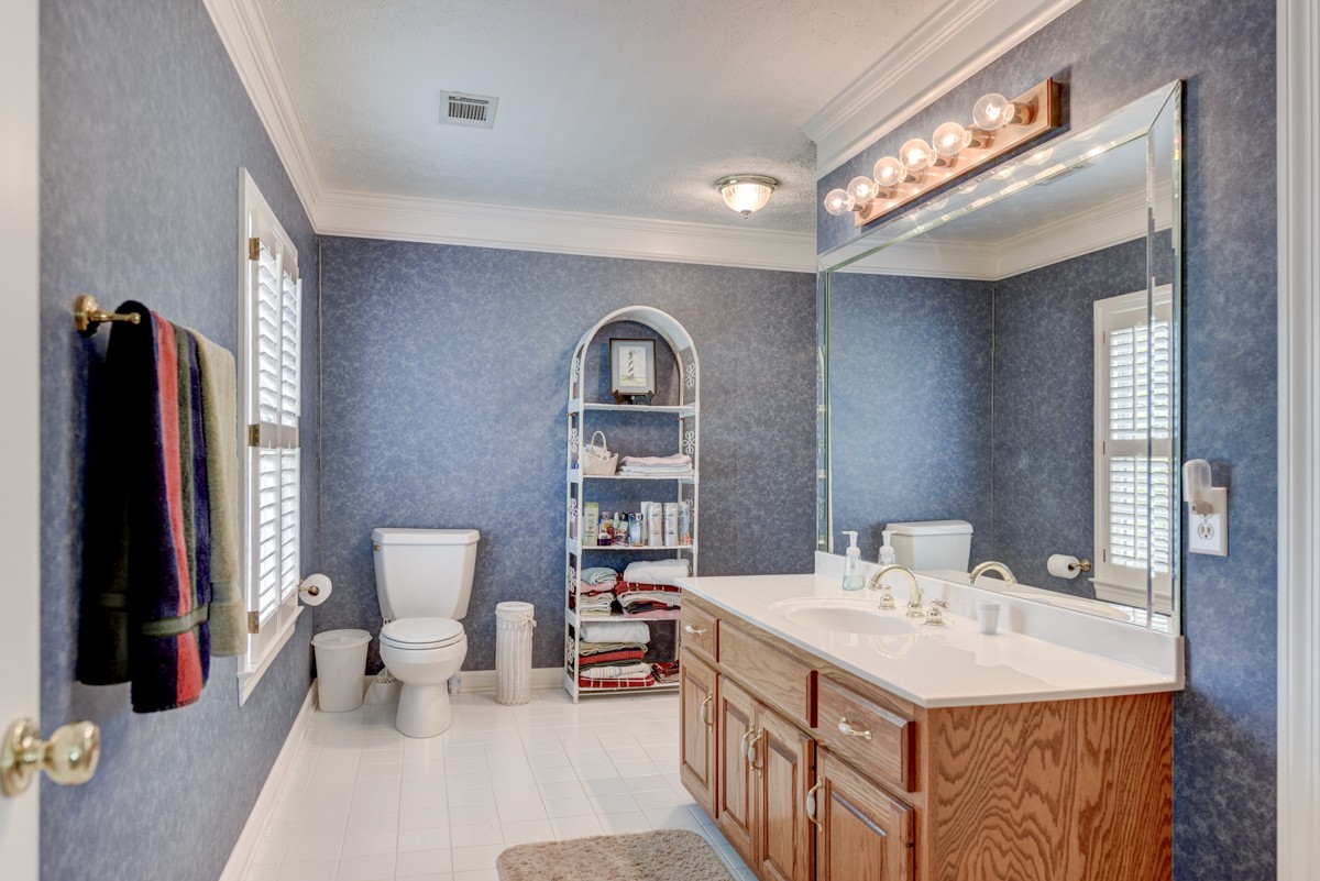 519 Maple Hill Road Lebanon, TN 37087 - Photo 27 of 49 a bathroom with a sink double vanity and a mirror