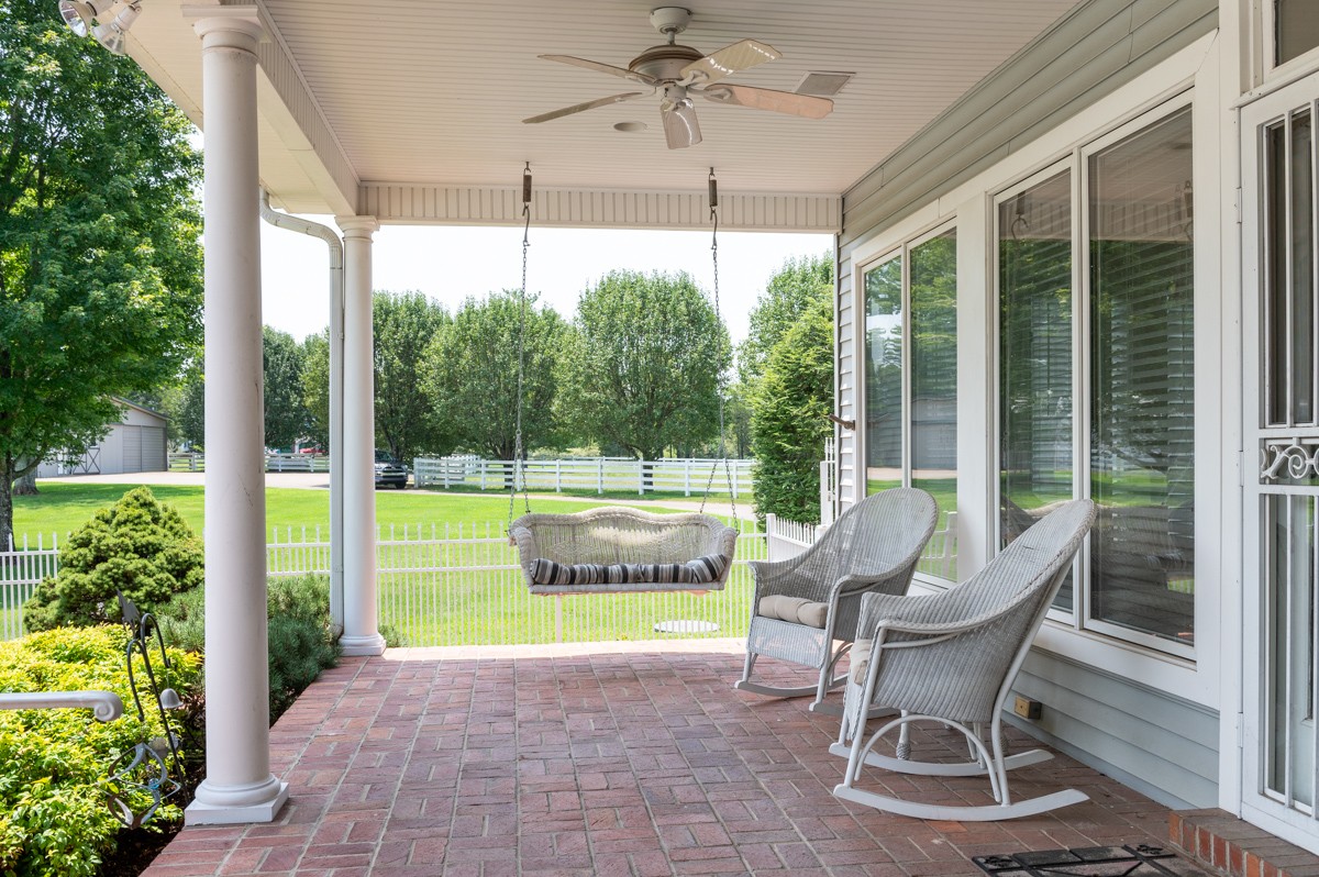 519 Maple Hill Road Lebanon, TN 37087 - Photo 37 of 49 a house view with a seating space and garden view