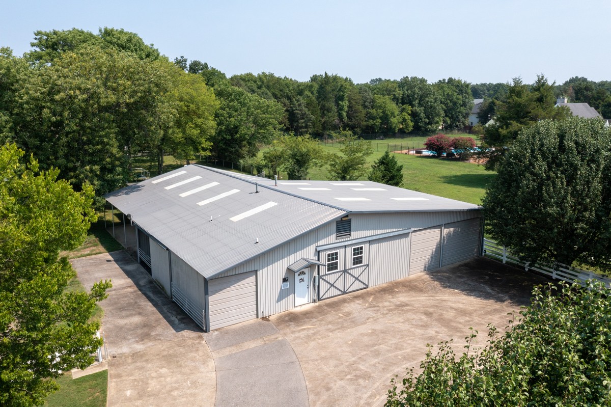 519 Maple Hill Road Lebanon, TN 37087 - Photo 41 of 49 an aerial view of a house with a yard space and balcony