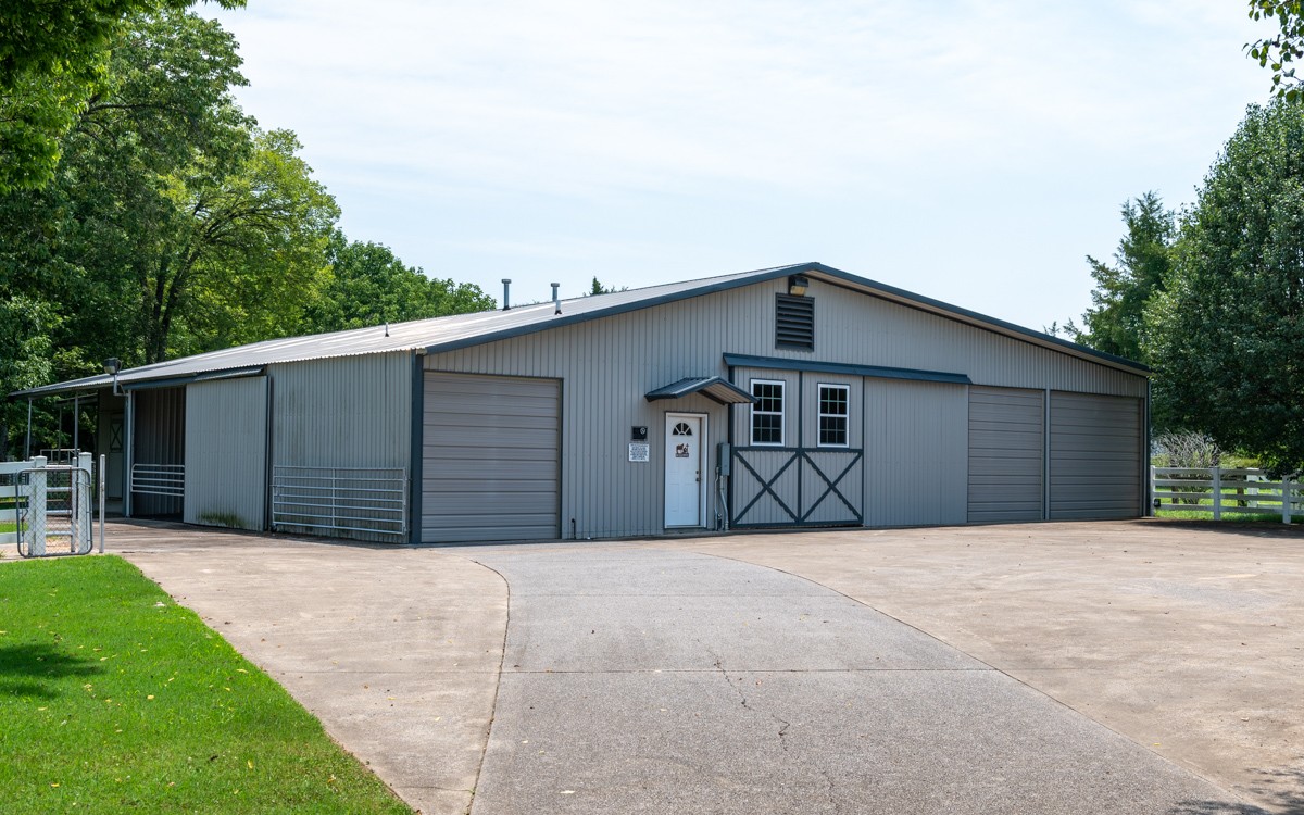 519 Maple Hill Road Lebanon, TN 37087 - Photo 42 of 49 a front view of a house with a yard and garage