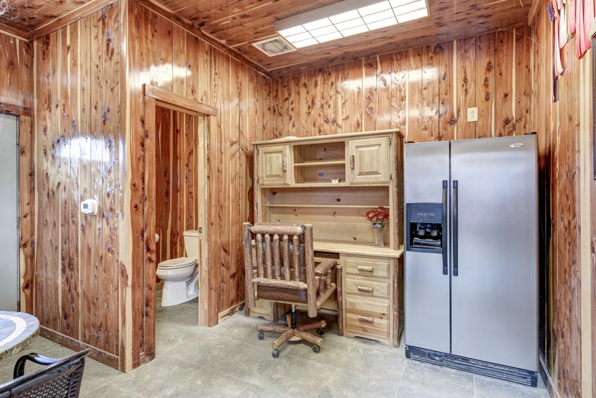 519 Maple Hill Road Lebanon, TN 37087 - Photo 45 of 49 a kitchen with a refrigerator and table