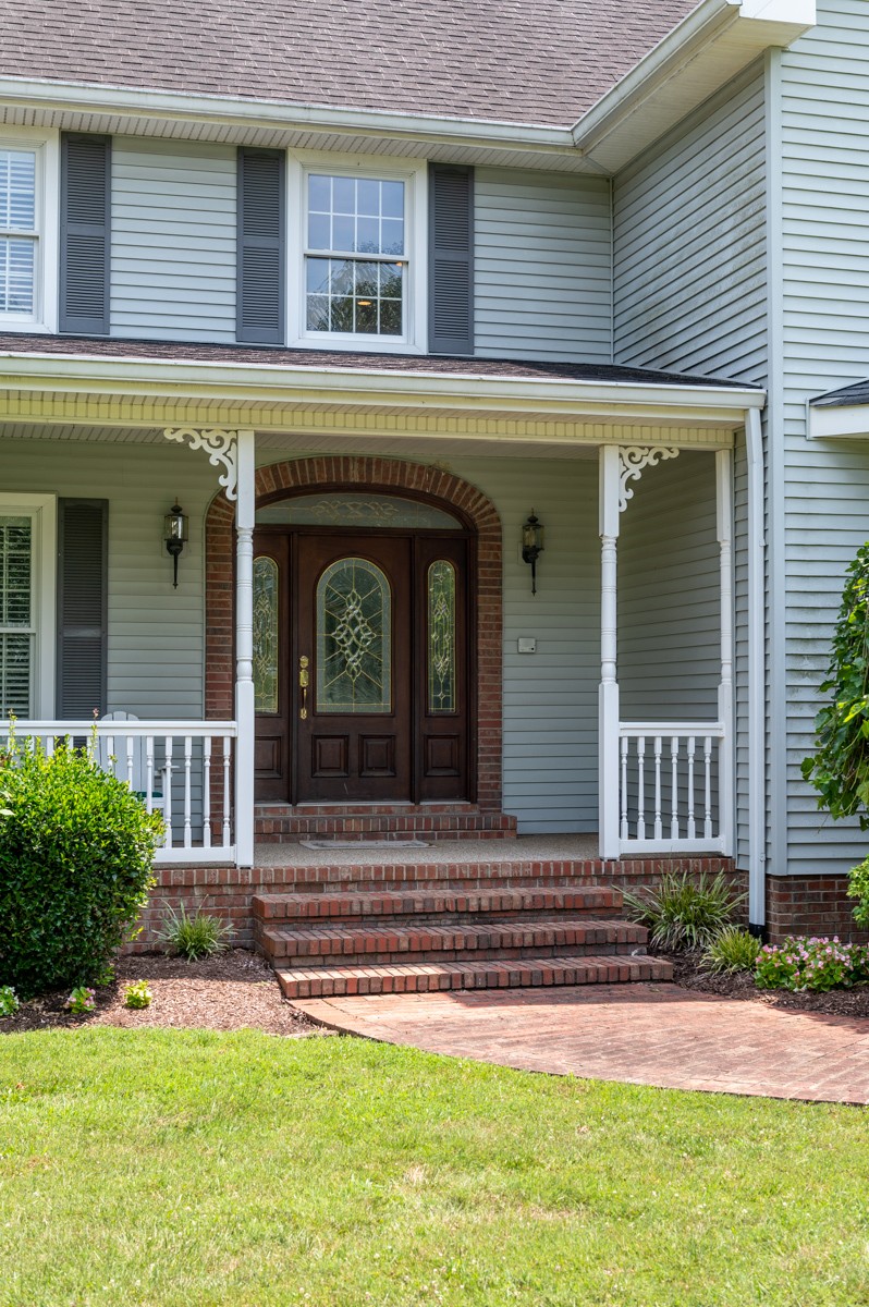 519 Maple Hill Road Lebanon, TN 37087 - Photo 6 of 49 a front view of a house with a yard