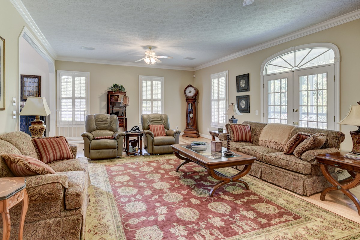 519 Maple Hill Road Lebanon, TN 37087 - Photo 10 of 49 a living room with furniture fireplace and a large window
