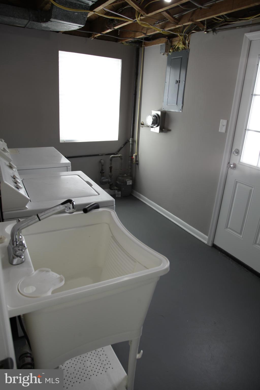3344 Ripple Road Windsor Mill, MD 21244 - Photo 27 of 30 a bathroom with a sink and a vanity