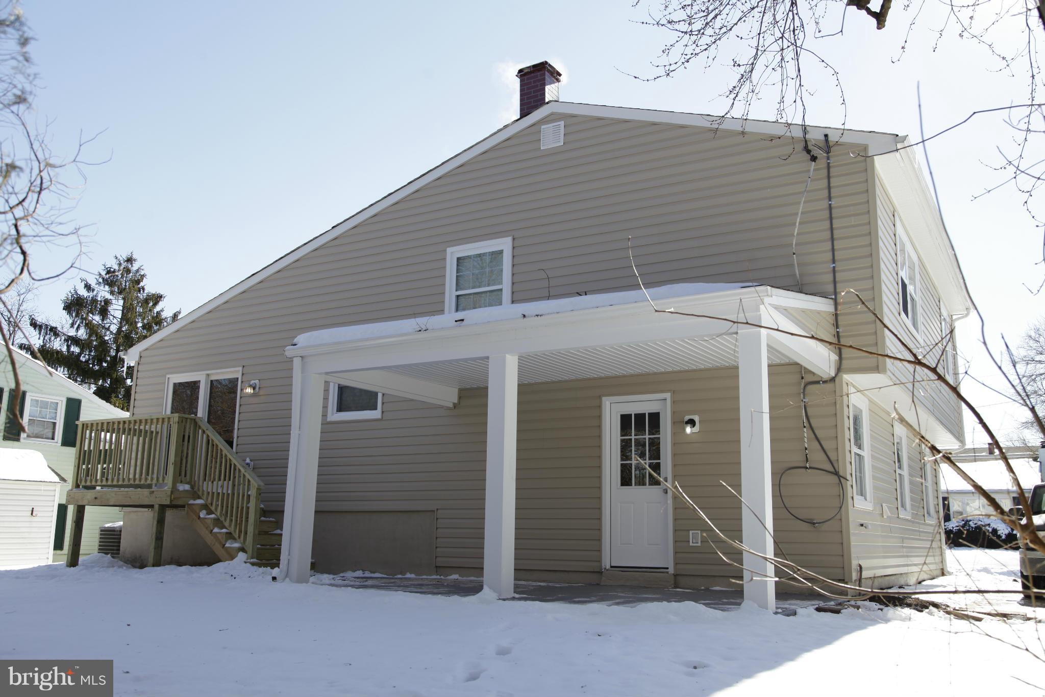 3344 Ripple Road Windsor Mill, MD 21244 - Photo 29 of 30 a front view of a house with a garage