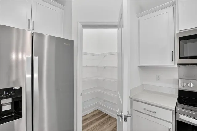 a bathroom with a shower and a sink