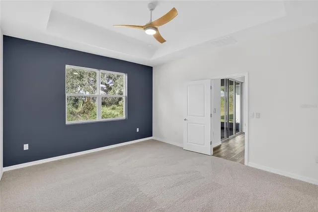 a view of an empty room and window