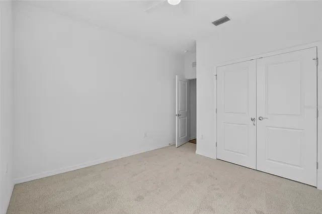 a view of a golf course with a trees