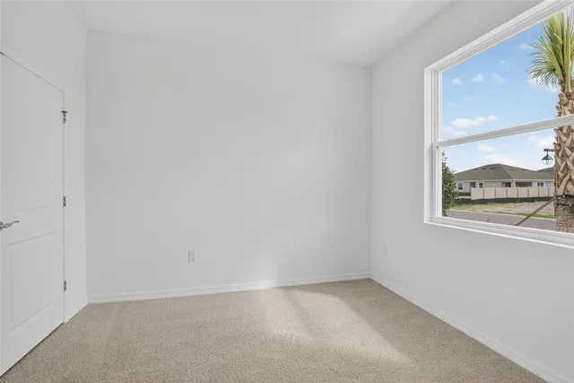 a house view with a backyard space
