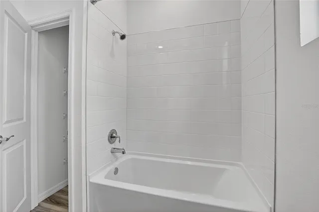 a front view of a house with seating space