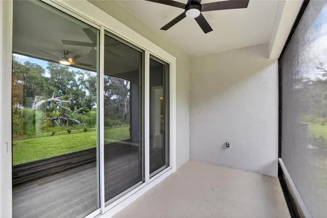 a front view of a house with a garden and yard