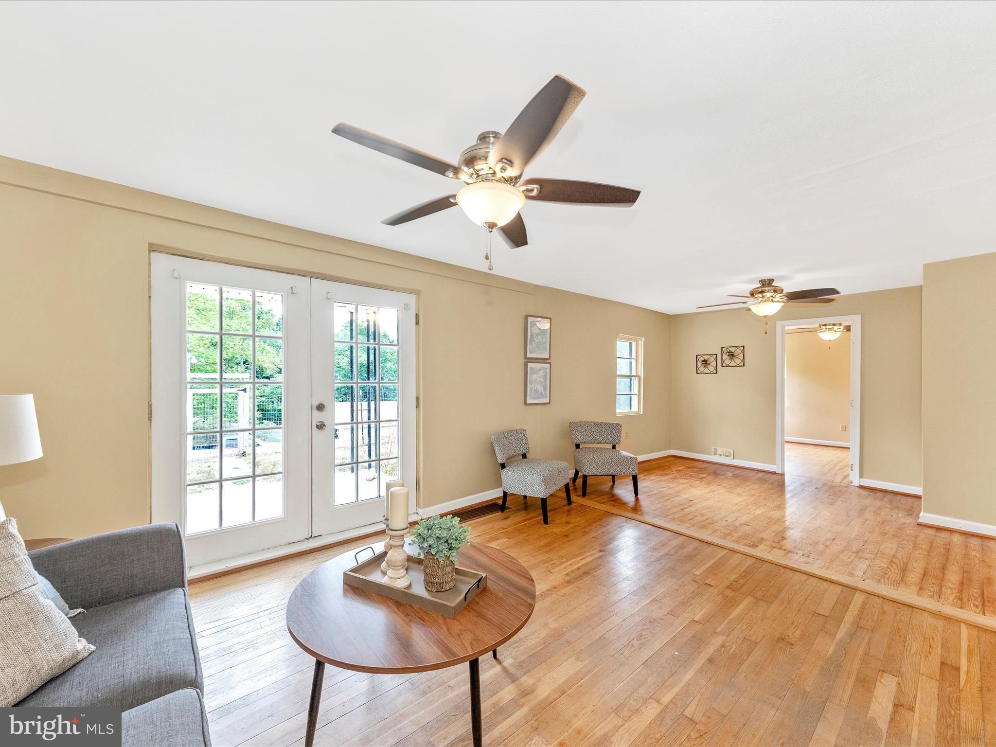 6 Myers Trail Berkeley Springs, WV 25411 - Photo 11 of 39 a living room with furniture and a large window