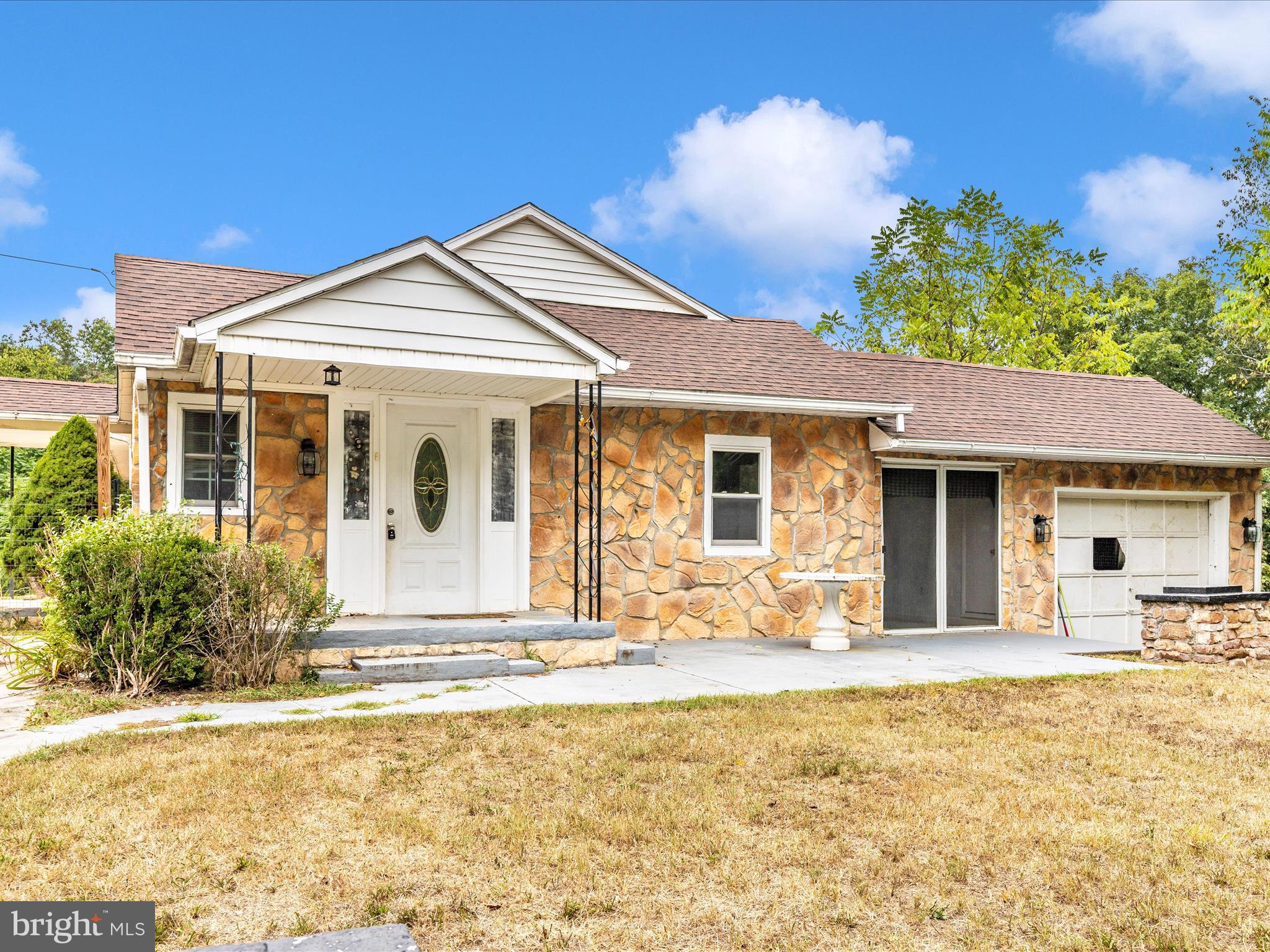 6 Myers Trail Berkeley Springs, WV 25411 - Photo 28 of 39 a front view of a house with a yard