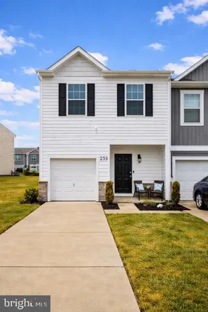 a front view of a house with patio