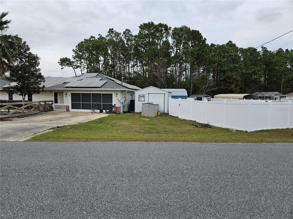 11 Pecan Pass Loop Ocala, FL 34472 - Photo 1 of 1 a view of house with outdoor space and yard