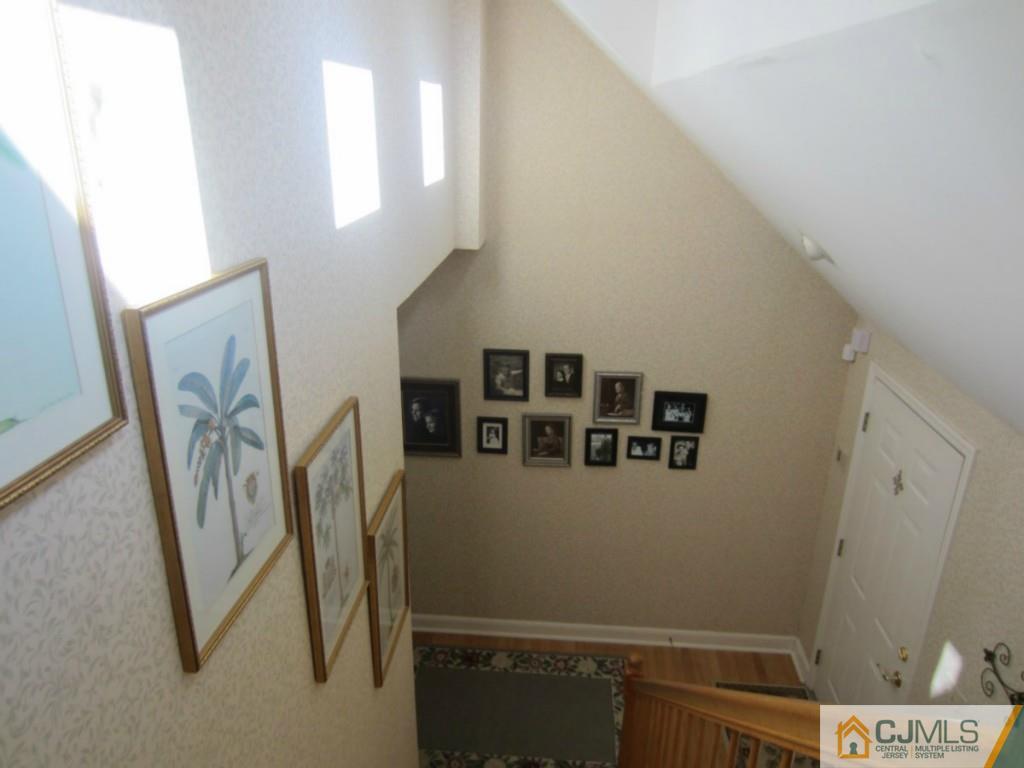 4 Edgebrook Road New Brunswick, NJ 08901 - Photo 12 of 22 a view of a hallway with workspace